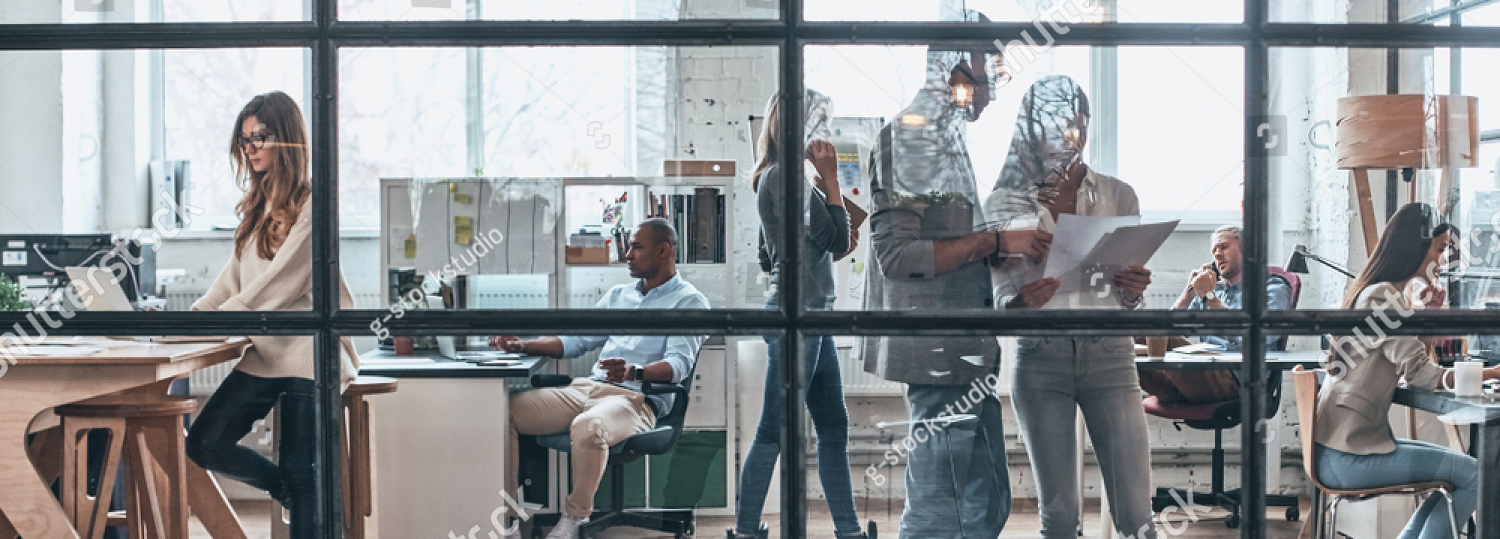 Professional team collaborating, demonstrating emotional intelligence in workplace communication, showing diverse colleagues engaging in supportive, empathetic interaction